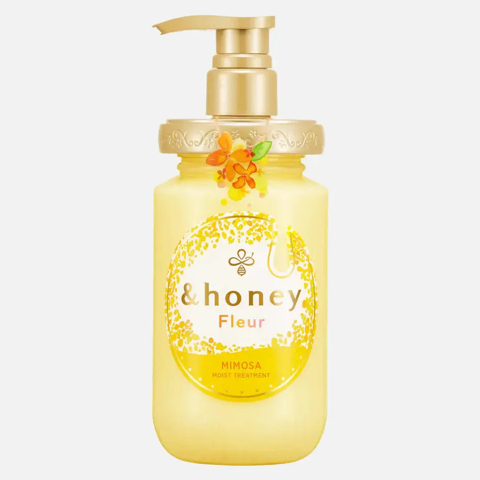 &honey Fleur Mimosa Moist Treatment bottle with floral design for ultimate hair hydration and long-lasting fragrance.