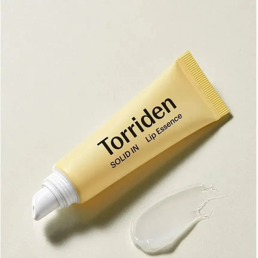 Torriden SOLID IN Ceramide Lip Essence tube with cream texture, perfect for hydrating and nourishing lips.