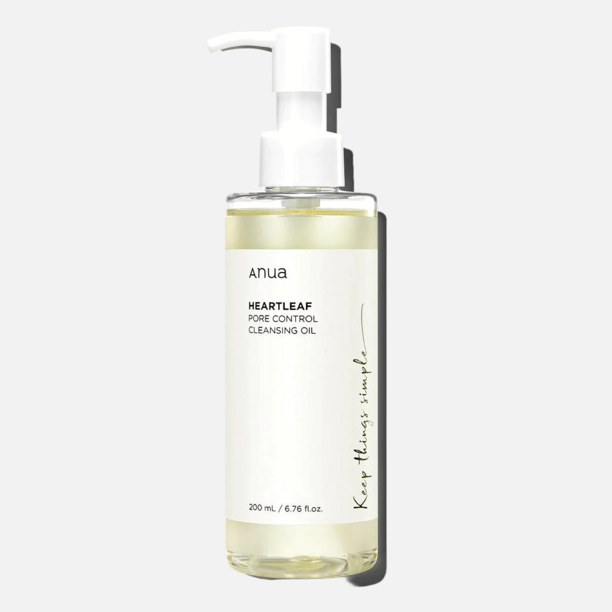 Anua Heartleaf Pore Control Cleansing Oil in a pump bottle, designed to remove makeup and excess sebum.