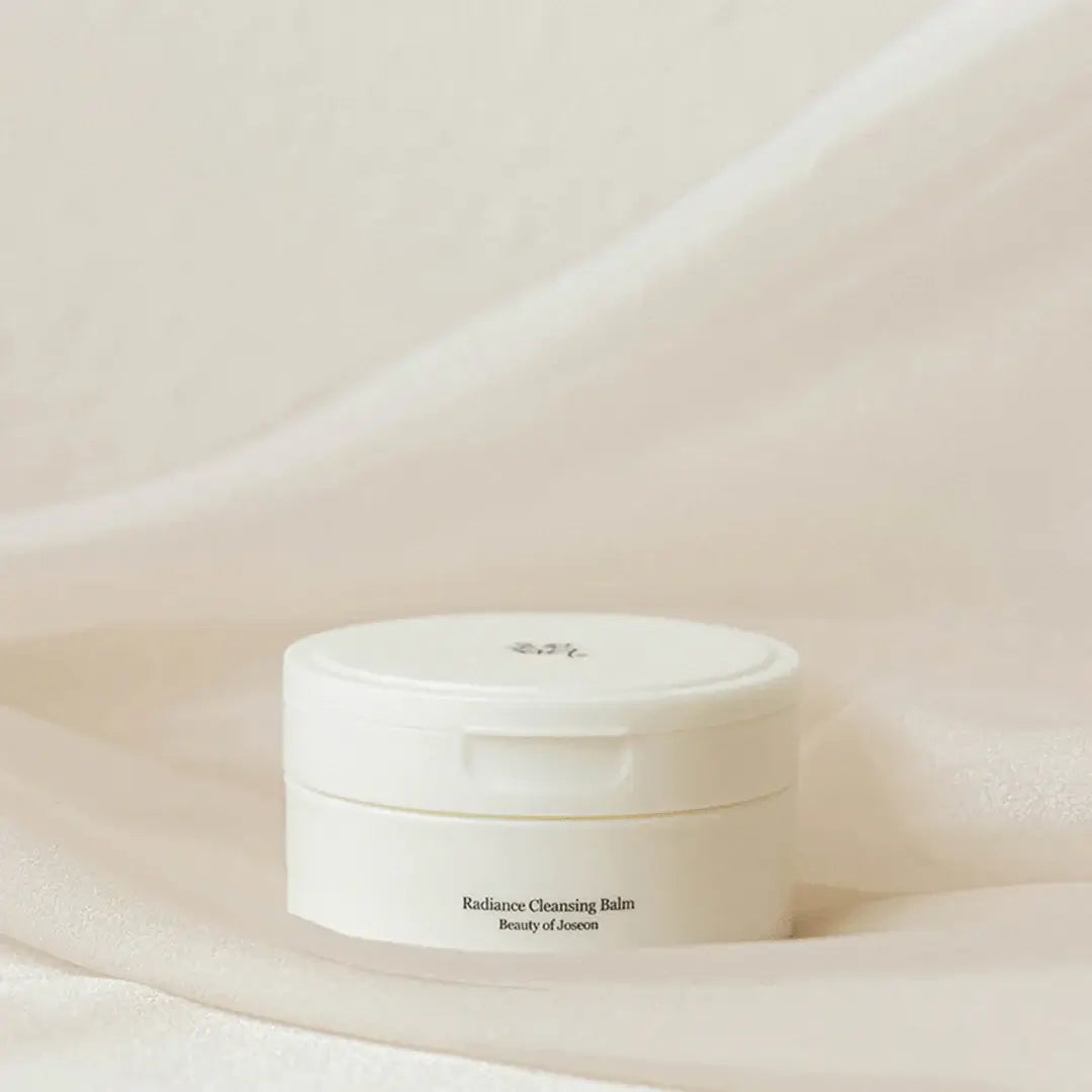Beauty of Joseon Radiance Cleansing Balm on soft fabric, designed to gently remove makeup and impurities.