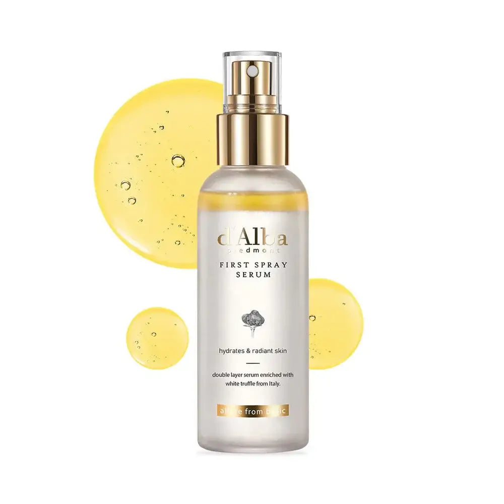 d'Alba White Truffle VEGAN First Spray Serum in a sleek bottle with yellow serum droplets for radiant skin hydration.