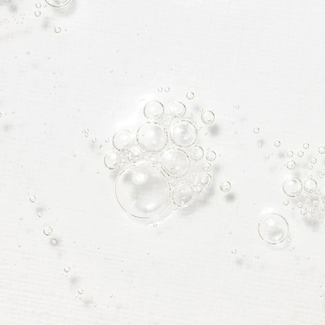 Close-up of clear serum bubbles, showcasing hydration and texture from Beauty of Joseon Glow Deep Serum.