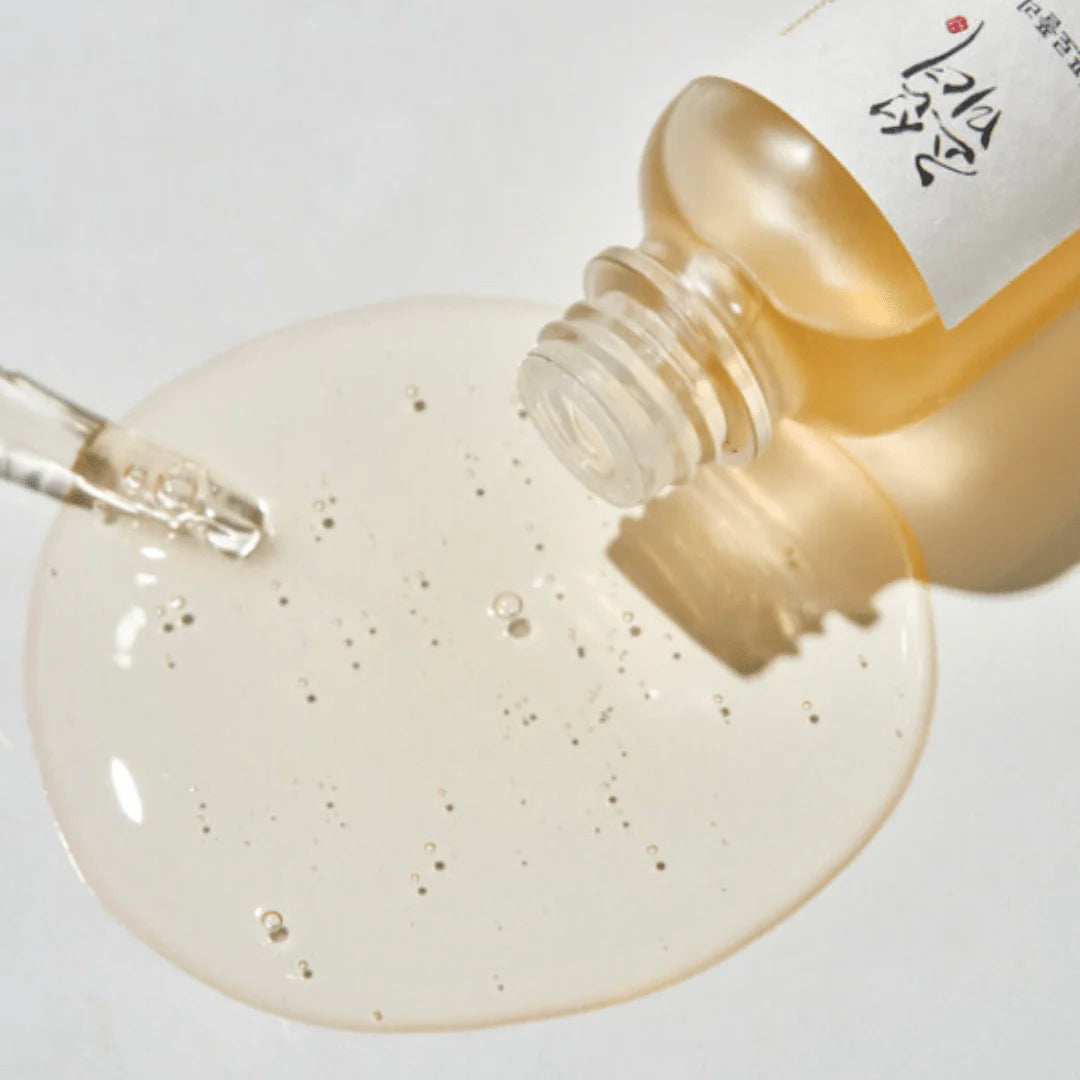 Beauty of Joseon Glow Serum with droplet on a surface, showcasing its nourishing propolis and niacinamide formula.