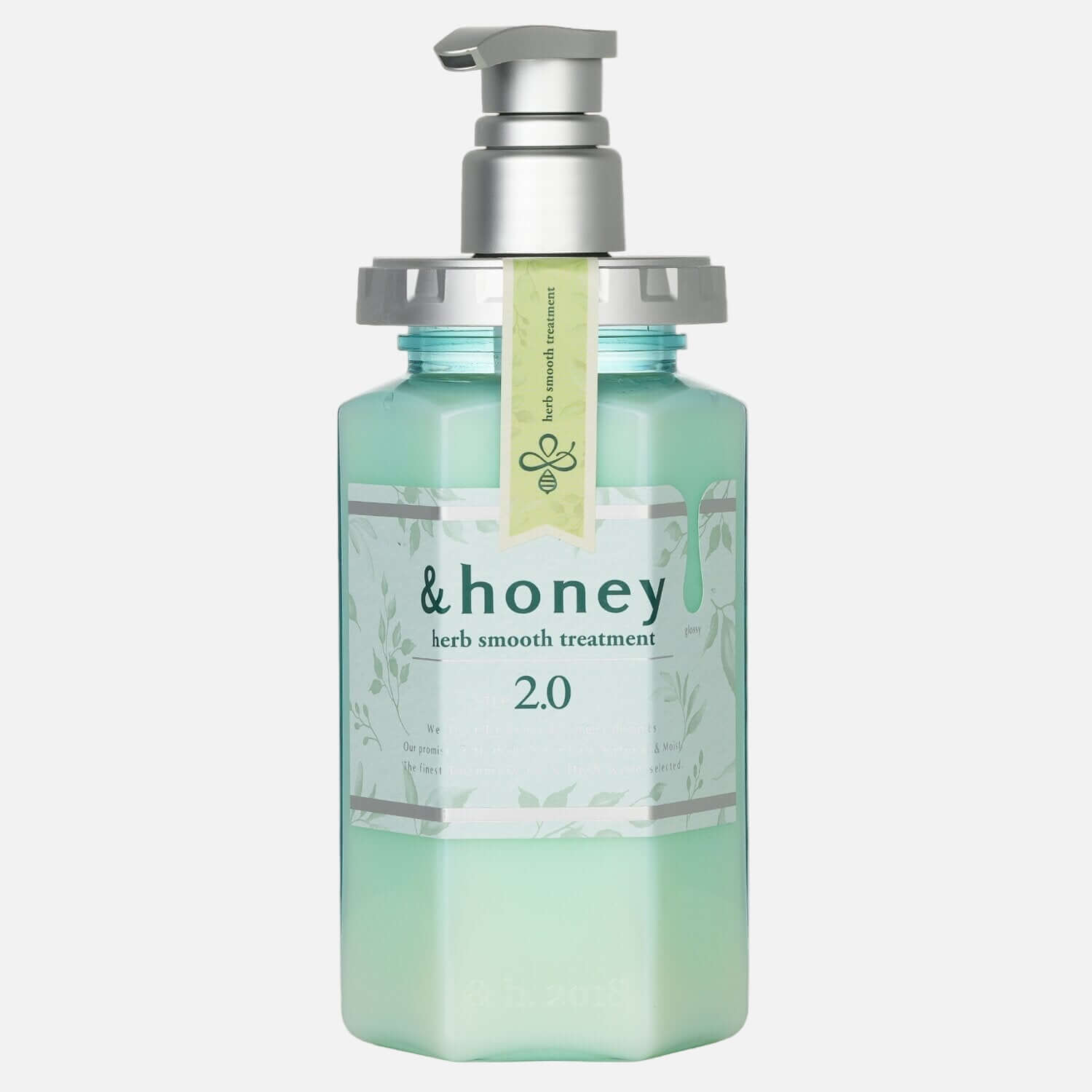 &Honey Herb Smooth Treatment 2.0 bottle showcasing its hydrating formula with natural herbs and organic rosemary oil.