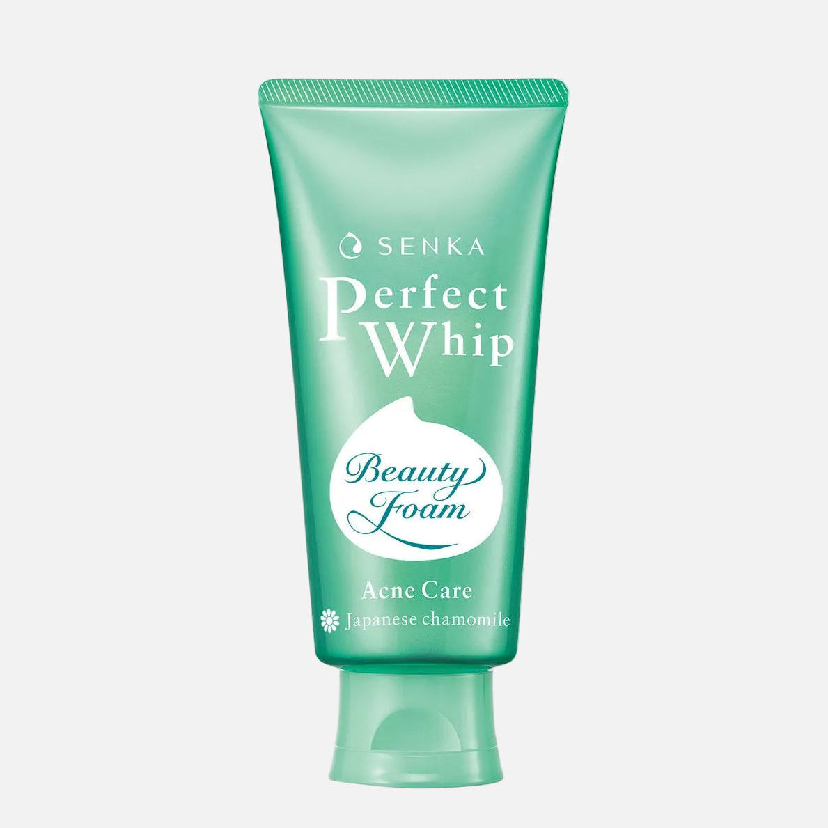 A squeeze tube of Senka Perfect Whip Beauty Foam Aene Care Japanese chamomile acne care foam, in a mint green color, on a plain white background.