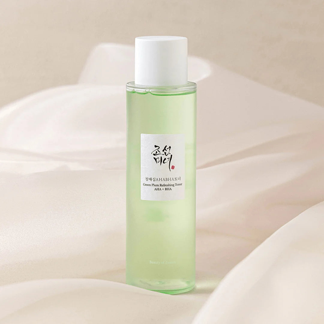 Beauty of Joseon Green Plum Refreshing Toner AHA BHA in a bottle on soft fabric backdrop