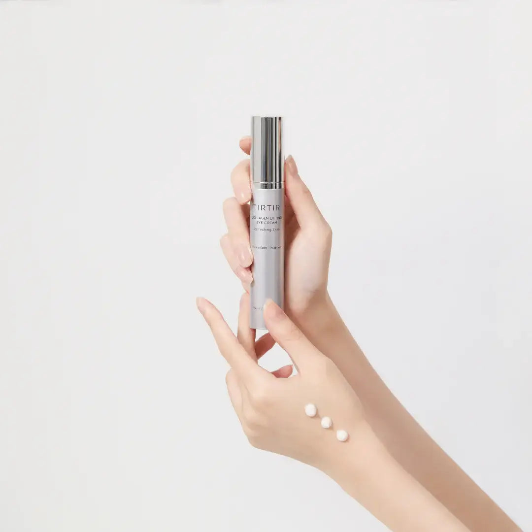 TIRTIR Collagen Lifting Eye Cream in hand, showing product and three cream dots on the skin.