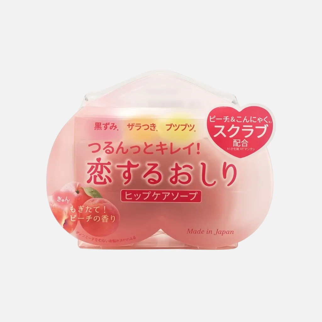 Pink soap bar with Japanese text and peach graphics on a white background
